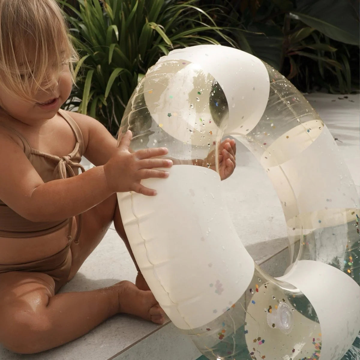 sunnylife-mini-tube-pool-ring-cotton-candy-stripe-poolside