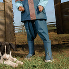Child wearing Crywolf Rain Boots Highland Blue outdoors
