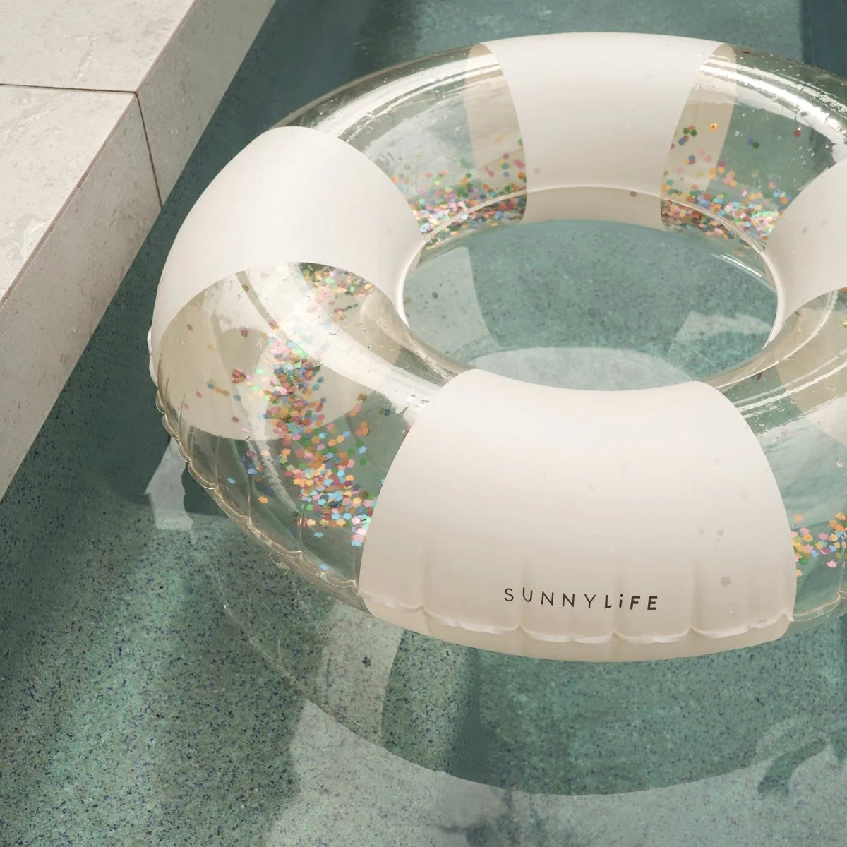 sunnylife-mini-tube-pool-ring-cotton-candy-stripe-poolside