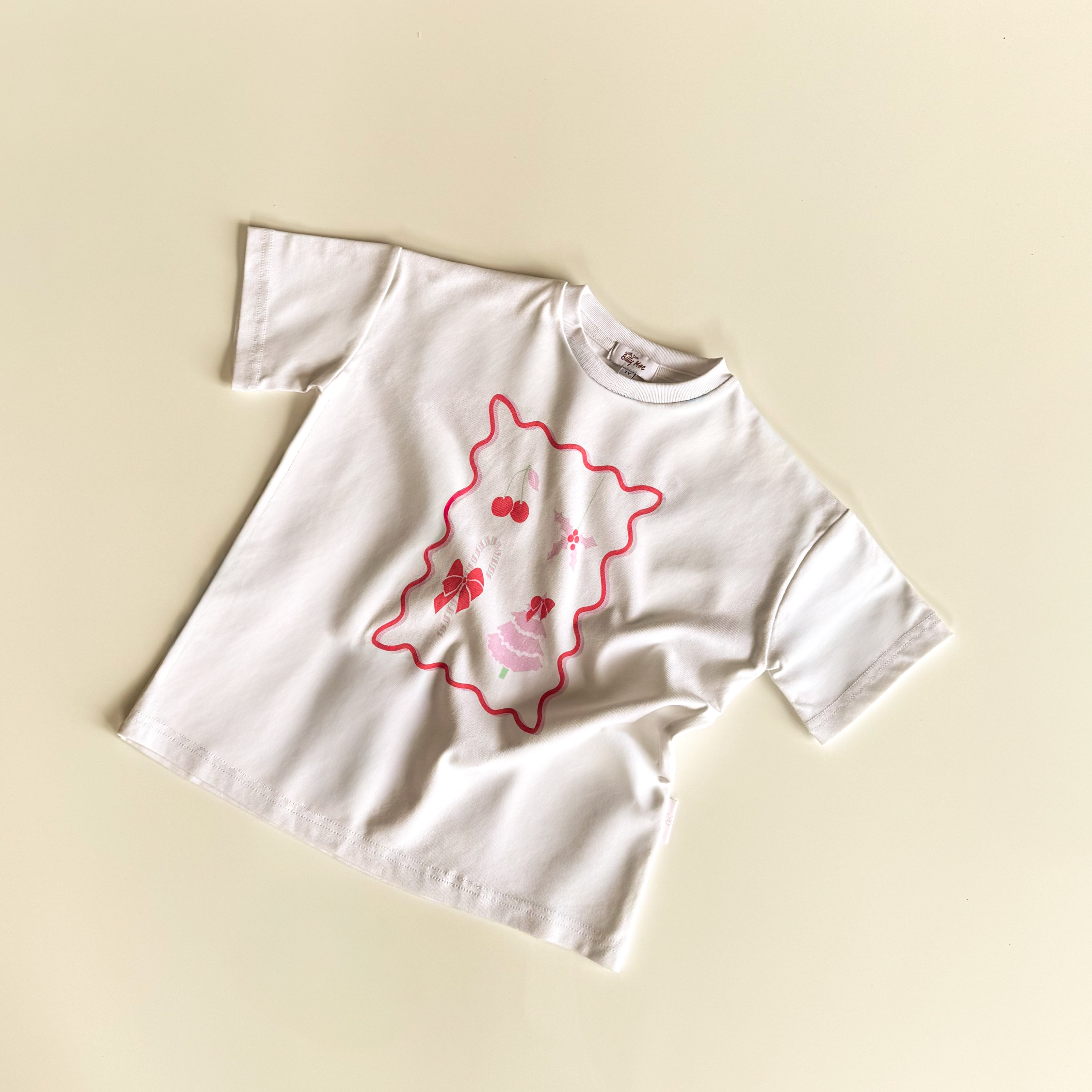 A billy mae christmas stamp oversized boxy tee now available at white Fox & Co
