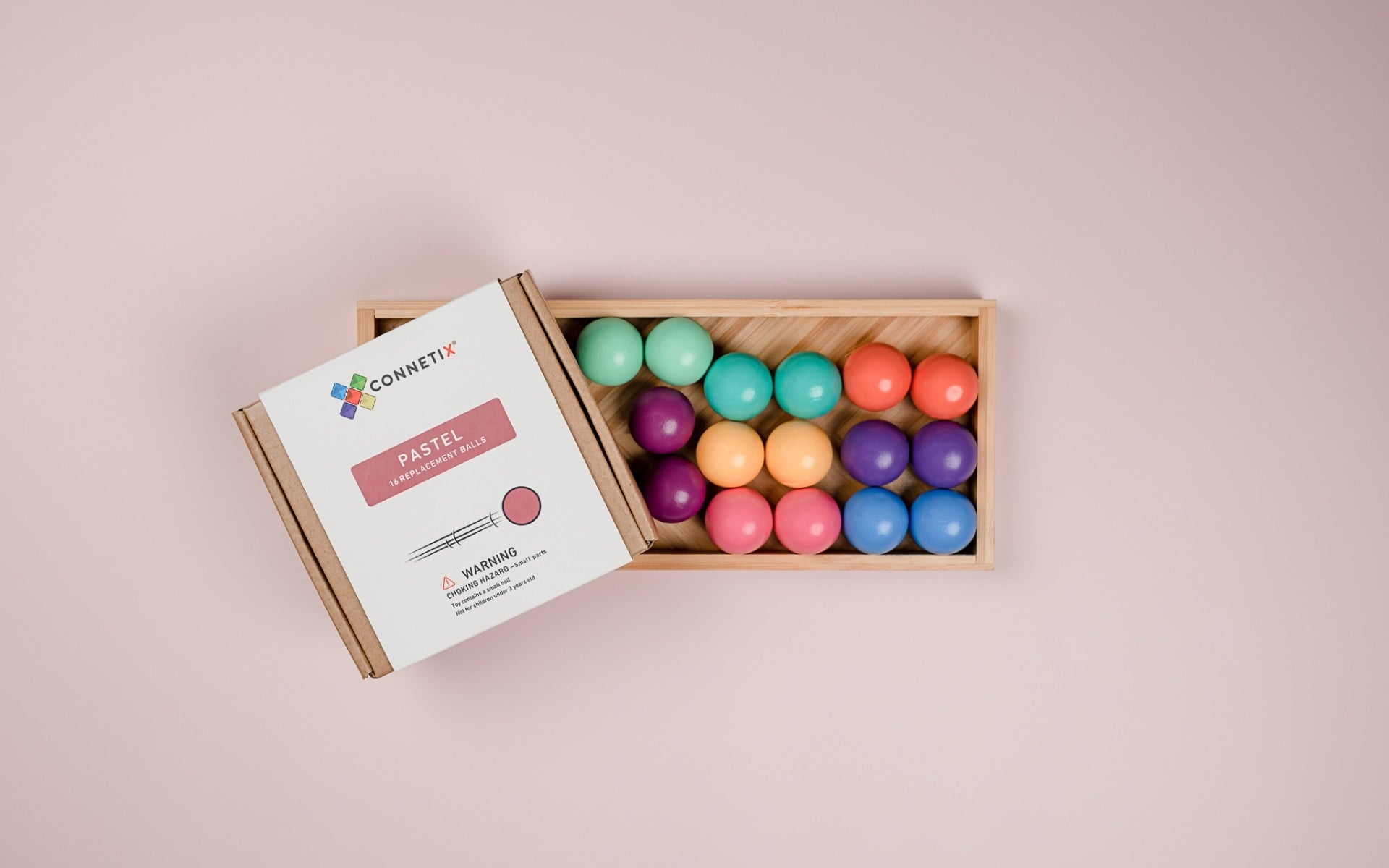 Pastel coloured Connetix balls displayed in packaging