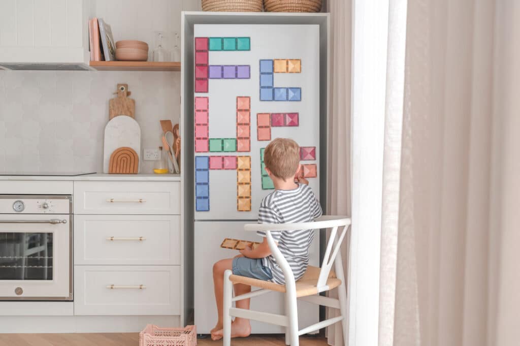 Child playing with Connetix Pastel Rectangle Pack