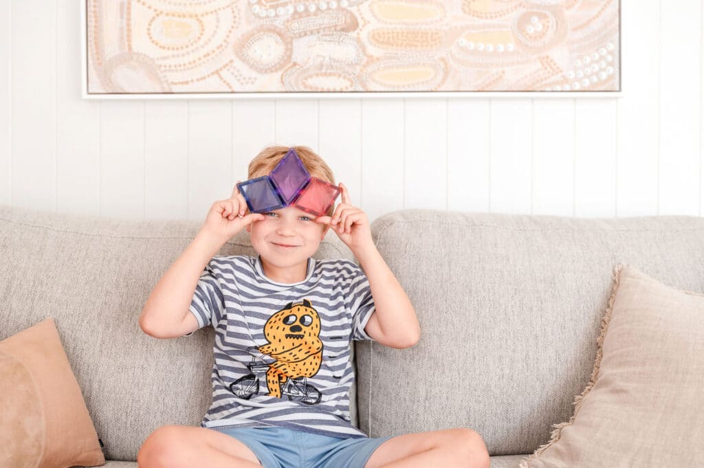 Children building creative 3D structures using Connetix Pastel Shape Expansion Pack