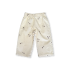 Organic denim pants in Milk with wild flower embroidery, front view