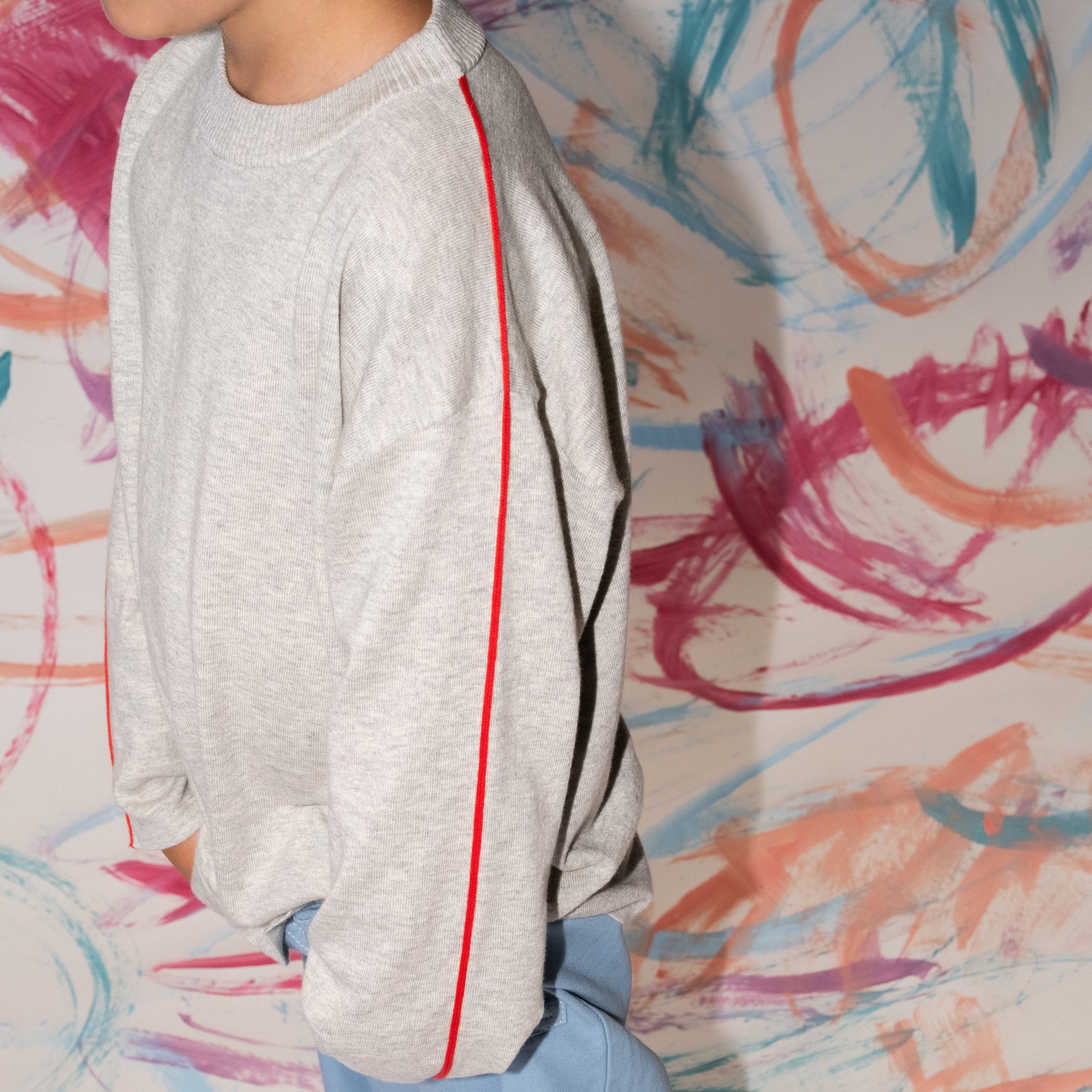 Close-up of organic cotton knit fabric texture in grey marle