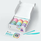 Box of colorful clay with a tool on a white background - hey clay monsters set