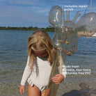 Children playing in the pool with Sunnylife Cotton Candy Glitter kids inflatable noodles